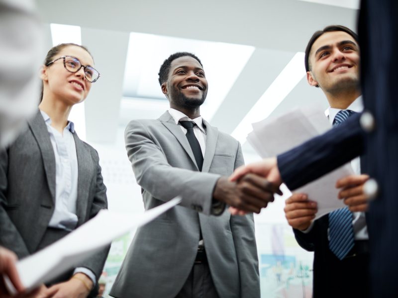 African Businessman Greeting Partner