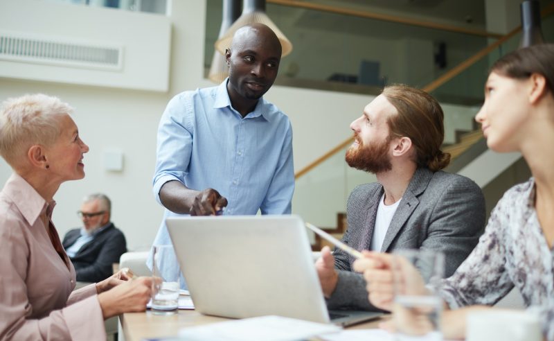 African Businessman Leading Meeting