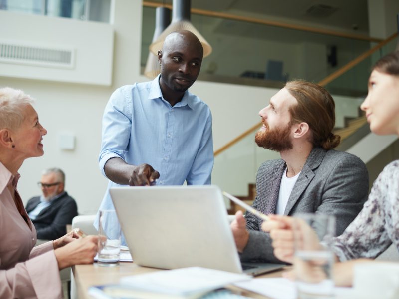 African Businessman Leading Meeting