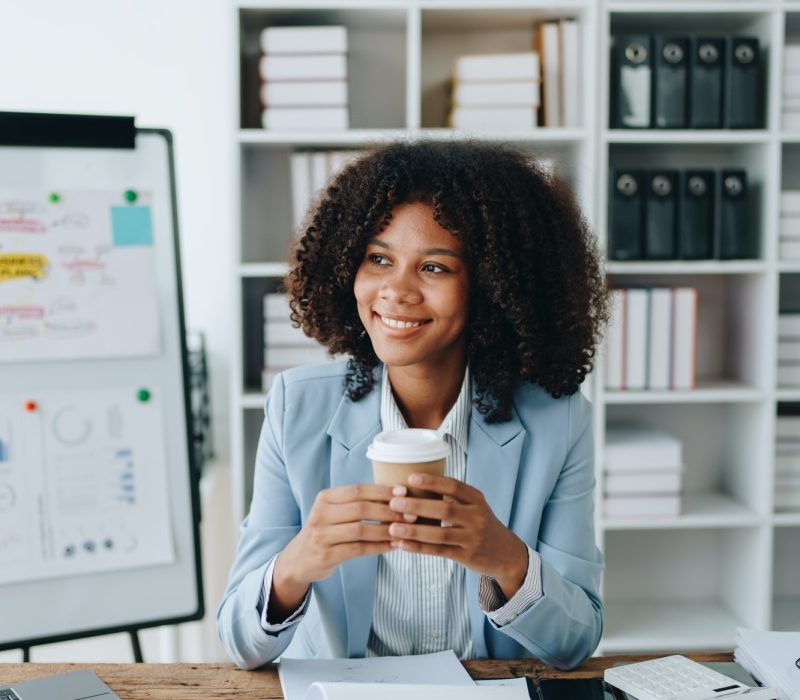 American African business woman using document,